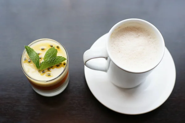 coffee and green tea on a wooden background