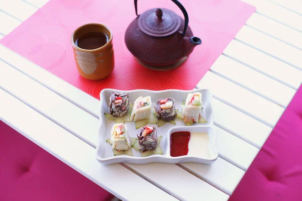 White Plate Japanese Sushi Rolls Tea Kettle Cup Wooden Table — Stock Photo, Image