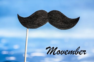 Movember sembolü. Poster ve başlık sayfası. Erkekler Sağlık sorunları, prostat kanseri gibi bilincini.