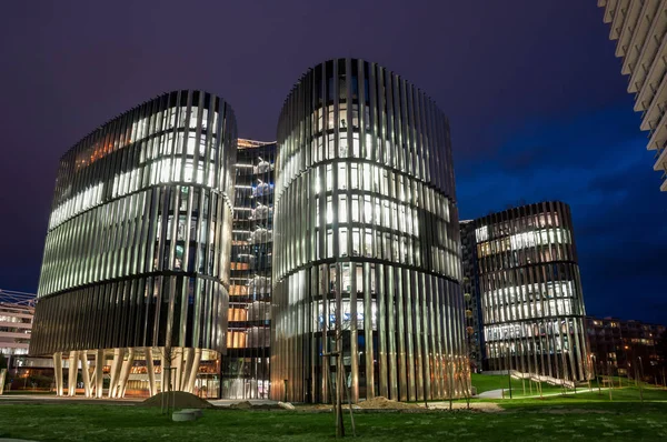 Business skyscrapers at night — Stock Photo, Image