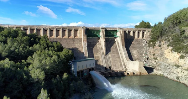 Water reservoir and hydroelectric power generating station in Spain. Horizontal composition.