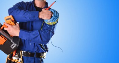 Background with uniformed electrician with tools and electrical equipment and blue background. detail Front view. clipart