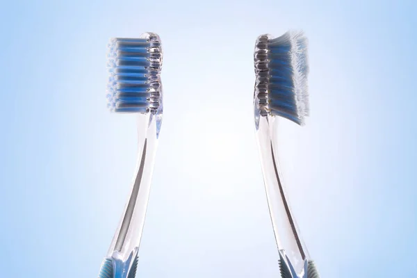 Comparison between new and used tooth brush backwards — Stock Photo, Image