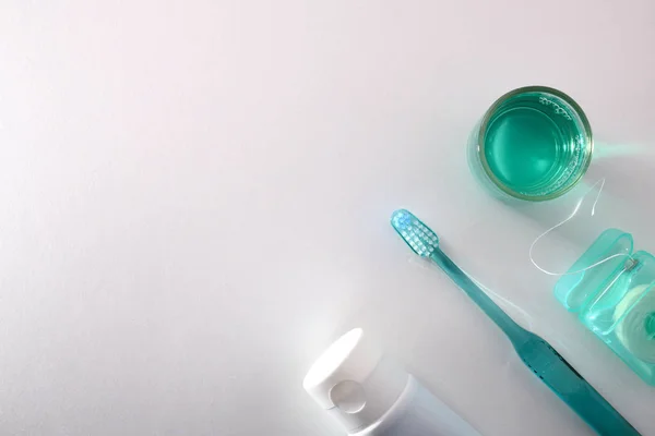 Concept equipment for oral cleaning on a white table top view — Stock Photo, Image