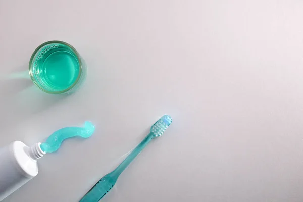 Concept equipment for oral cleaning on a white table top view — Stock Photo, Image