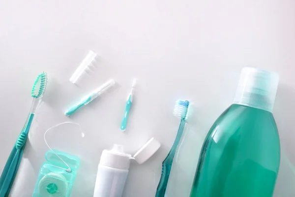 Equipment for oral hygiene on white table top general view — Stock Photo, Image