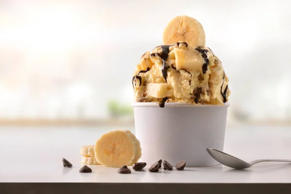 Banana ice cream cup on white table homemade in kitchen — Stock Photo, Image