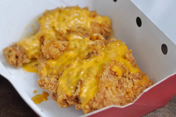 Fried chicken, deep fried chicken with cheese topping — Stock Photo, Image