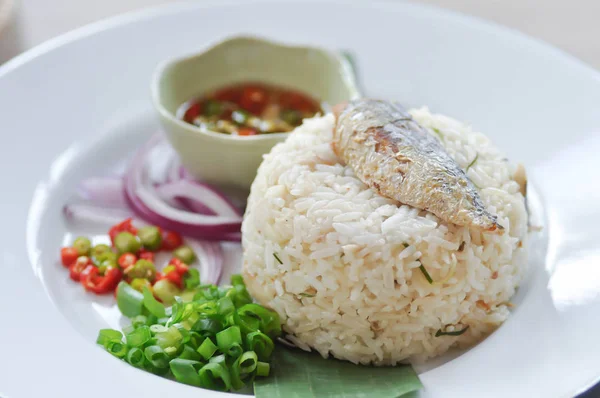fried rice or stir-fried rice with fish, rice topped with fish
