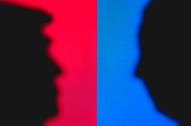NEW YORK, USA, JUN 17, 2020: Silhouette of republican candidate Donald Trump and democratic candidate Joe Biden. 2020 United States presidential election. US vote, Concept photo for November 3, 2020 clipart
