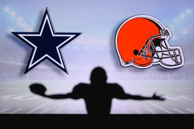 Dallas Cowboys Cleveland Browns 'a karşı. NFL oyunu. Amerikan Futbol Ligi maçı. Profesyonel oyuncunun silueti dokunuşu kutluyor. Arkaplanda ekran.