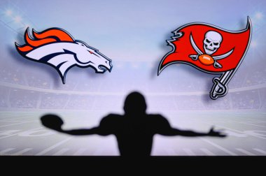 Denver Broncos vs. Tampa Bay Buccaneers. NFL Game. American Football League match. Silhouette of professional player celebrate touch down. Screen in background. clipart