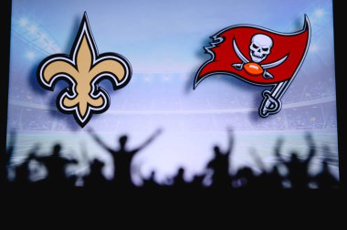 New Orleans Saints, Tampa Bay Buccaneers 'a karşı. Taraftarlar NFL Game 'i destekliyor. Destekçilerin silueti, arka planda iki rakibi olan büyük ekran.