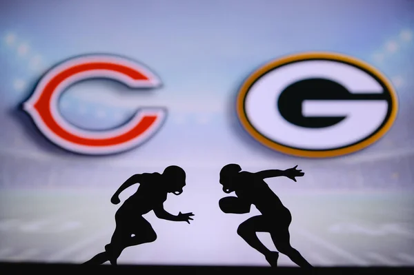 stock image Chicago Bears vs. Green Bay Packers. NFL match poster. Two american football players silhouette facing each other on the field. Clubs logo in background. Rivalry concept photo.