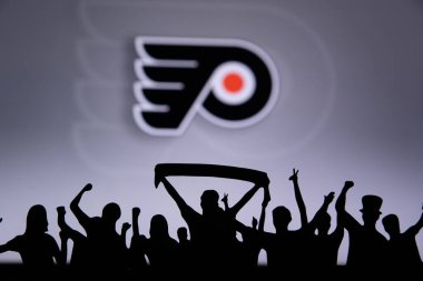 Philadelphia Flyers taraftarları NHL hokey takımını kutluyor ve destekliyor.