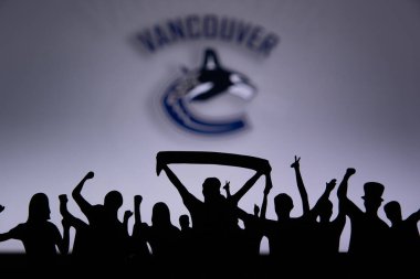TORONTO, Kanada, 17. Vancouver Canucks taraftarları NHL hokey takımını kutluyor ve destekliyor..