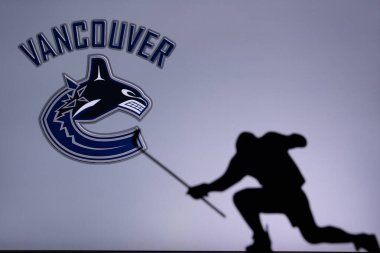 TORONTO, Kanada, 17. Vancouver Canucks Logosu. Profesyonel NHL hokey oyuncusu golü kutluyor. Siluet fotoğrafı, boşluğu düzenle