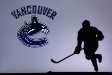 TORONTO, Kanada, 17. Vancouver Canucks konseptli fotoğraf. Profesyonel NHL hokey oyuncusunun silueti