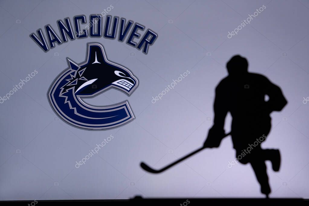 TORONTO, CANADA, 17. JULY: Vancouver Canucks Concept photo. silhouette of profesiional NHL hockey player