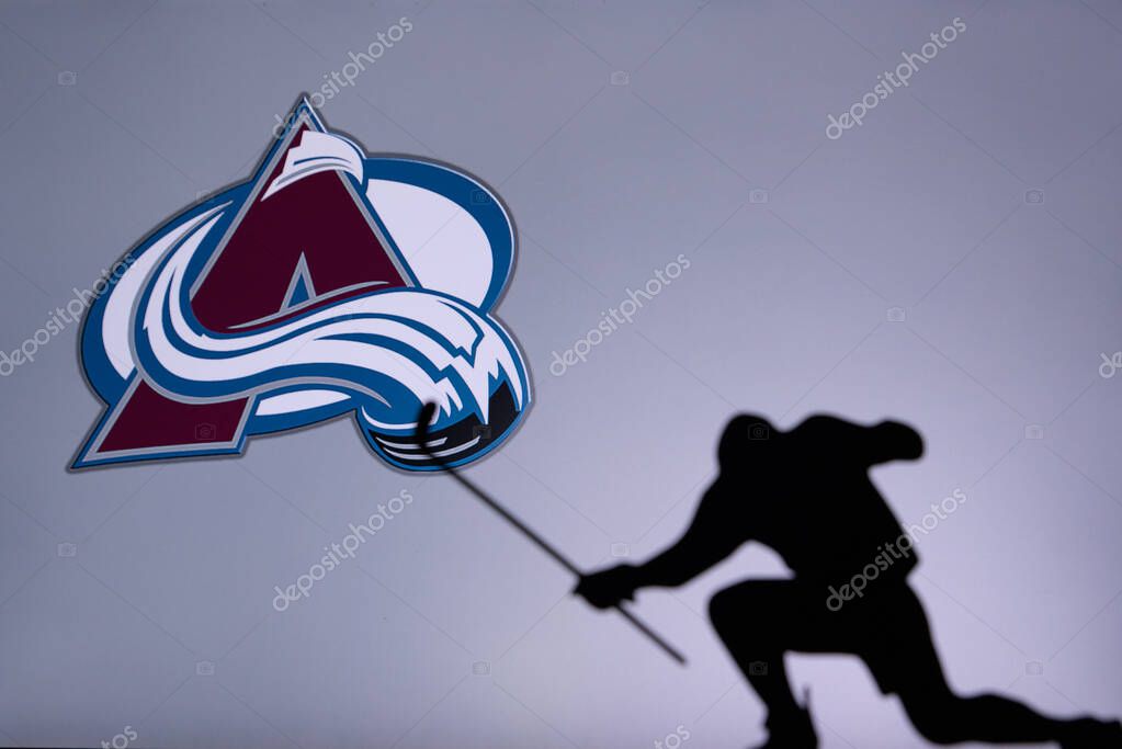 TORONTO, CANADA, 17. JULY: Colorado Avalanche Logo. Professional NHL hockey player celebrate goal. Silhouette photo, Edit space