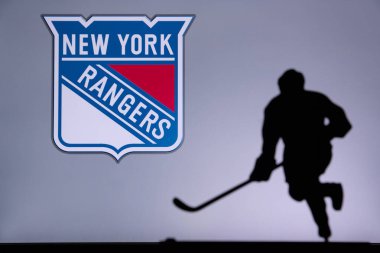TORONTO, CANADA, 17. JULY: New York Rangers Concept photo. silhouette of profesiional NHL hockey player clipart