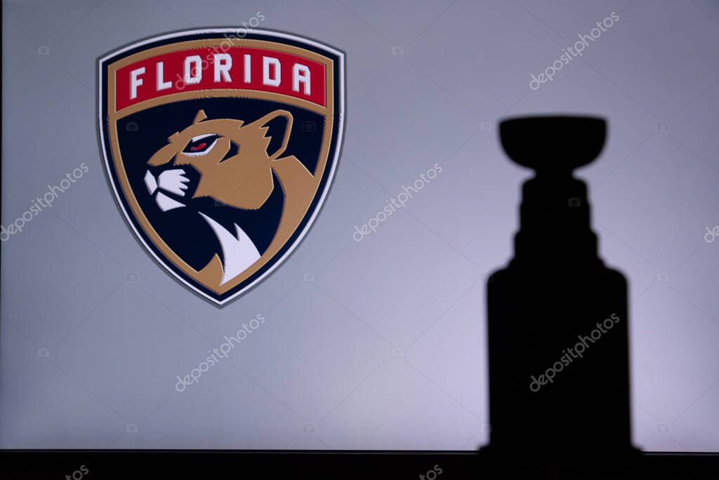 TORONTO, CANADA, 17. JULY: Florida PanthersLogo of NHL club on the screen. Stenley Cup Trophy Silhouette.
