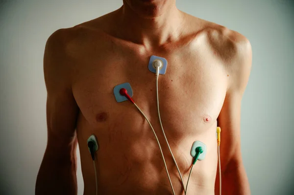 Monitoring Heart Vitality Young Man Torso Adorned Ekg Bathed Soft — Stock Photo, Image