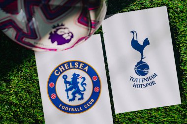 VIENNA, AUSTRIA, MAY 26, 2025: Chelsea vs Tottenham Hotspur derby football match in Premier League. Club logo and official ball on green soccer grass.