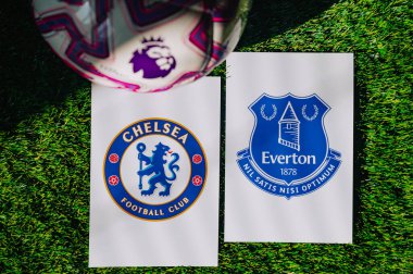 VIENNA, AUSTRIA, MAY 26, 2025: Chelsea vs Everton derby football match in Premier League. Club logo and official ball on green soccer grass.