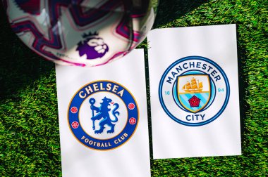 VIENNA, AUSTRIA, MAY 26, 2025: Chelsea vs Manchester City derby football match in Premier League. Club logo and official ball on green soccer grass.