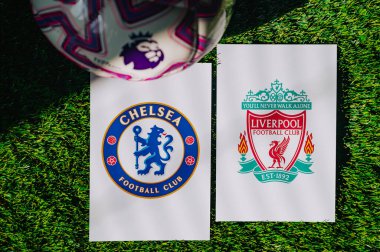 VIENNA, AUSTRIA, MAY 26, 2025: Chelsea vs Liverpool derby football match in Premier League. Club logo and official ball on green soccer grass.