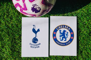 VIENNA, AUSTRIA, MAY 26, 2025: Tottenham Hotspur vs Chelsea derby football match in Premier League. Club logo and official ball on green soccer grass.