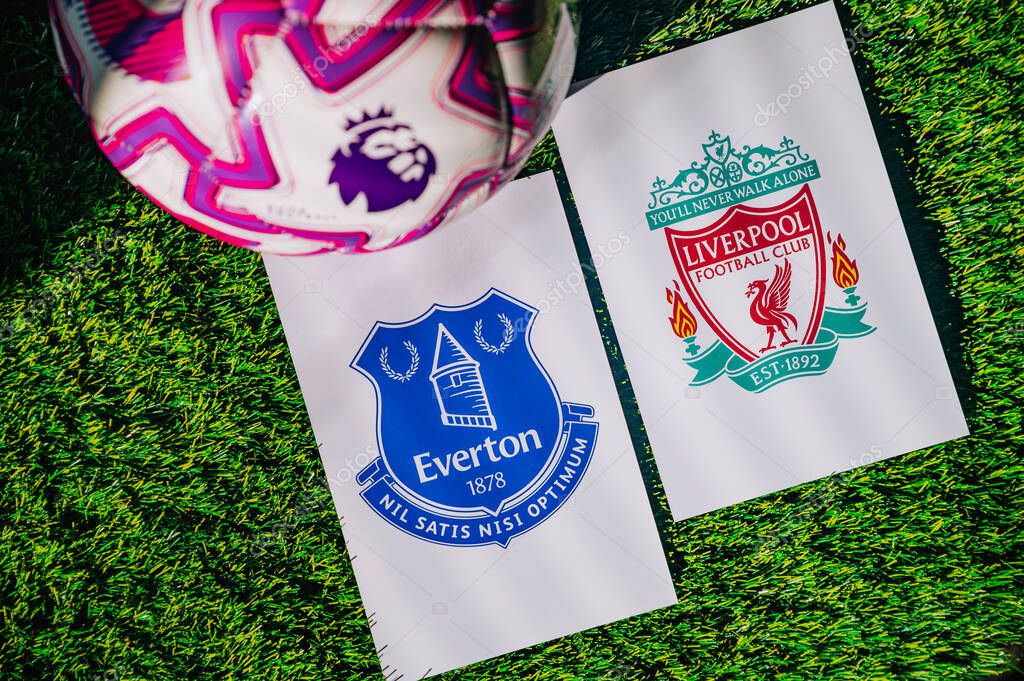 VIENNA, AUSTRIA, MAY 26, 2025: Everton vs Liverpool derby football match in Premier League. Club logo and official ball on green soccer grass. Merseyside Derby