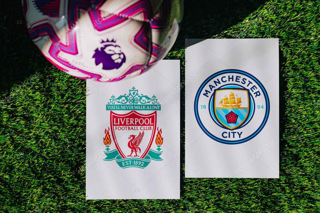 VIENNA, AUSTRIA, MAY 26, 2025: Liverpool vs Manchester City derby football match in Premier League. Club logo and official ball on green soccer grass.