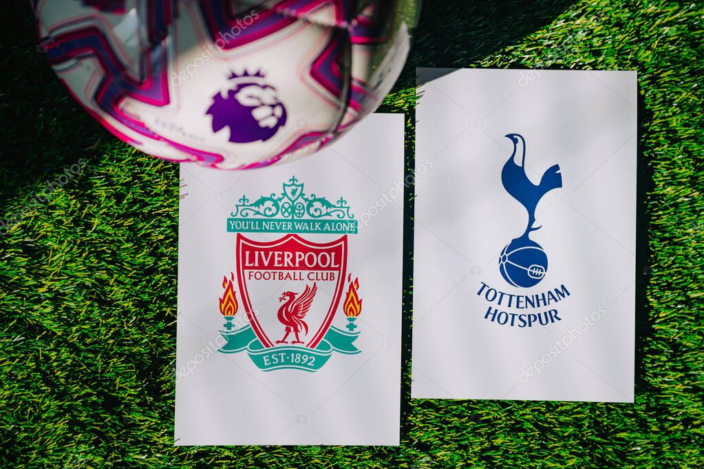 VIENNA, AUSTRIA, MAY 26, 2025: Liverpool vs Tottenham Hotspur derby football match in Premier League. Club logo and official ball on green soccer grass.