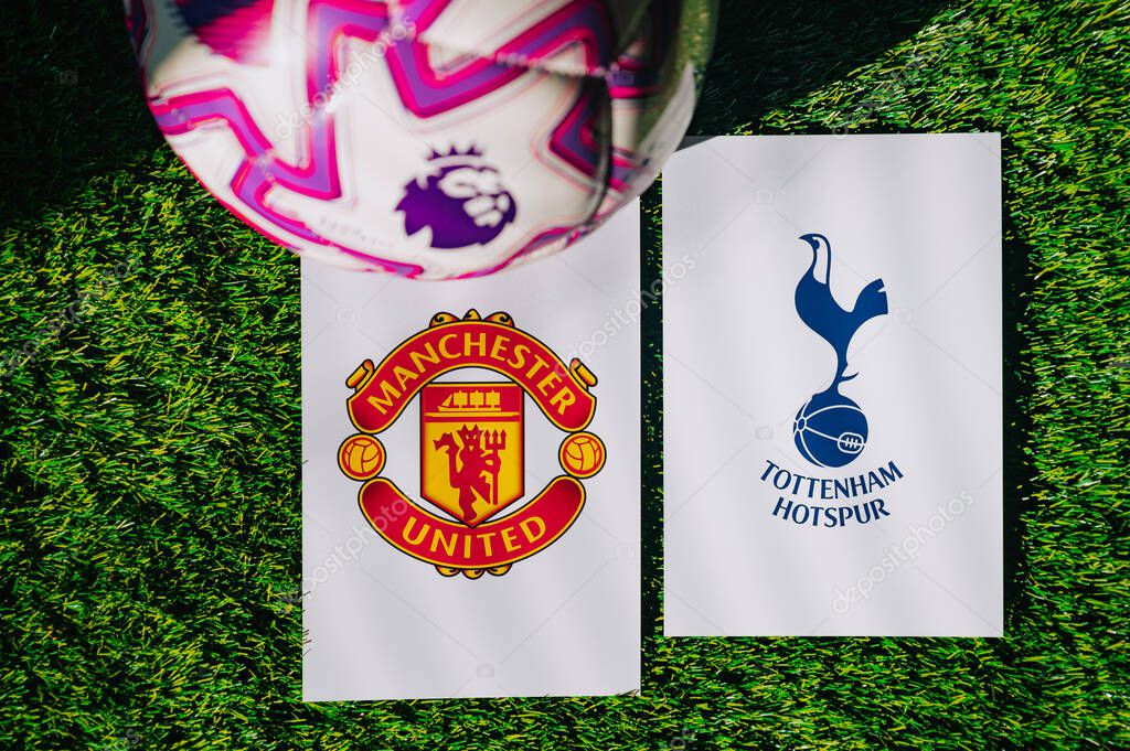 VIENNA, AUSTRIA, MAY 26, 2025: Manchester United vs Tottenham Hotspur derby football match in Premier League. Club logo and official ball on green soccer grass.