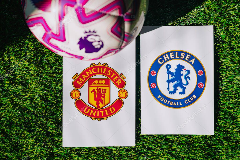 VIENNA, AUSTRIA, MAY 26, 2025: Manchester United vs Chelsea derby football match in Premier League. Club logo and official ball on green soccer grass.
