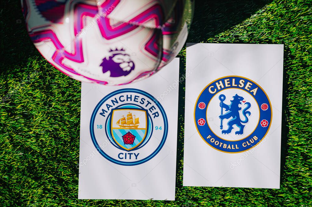 VIENNA, AUSTRIA, MAY 26, 2025: Manchester City vs Chelsea derby football match in Premier League. Club logo and official ball on green soccer grass.