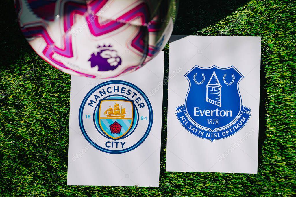 VIENNA, AUSTRIA, MAY 26, 2025: Manchester City vs Everton derby football match in Premier League. Club logo and official ball on green soccer grass.