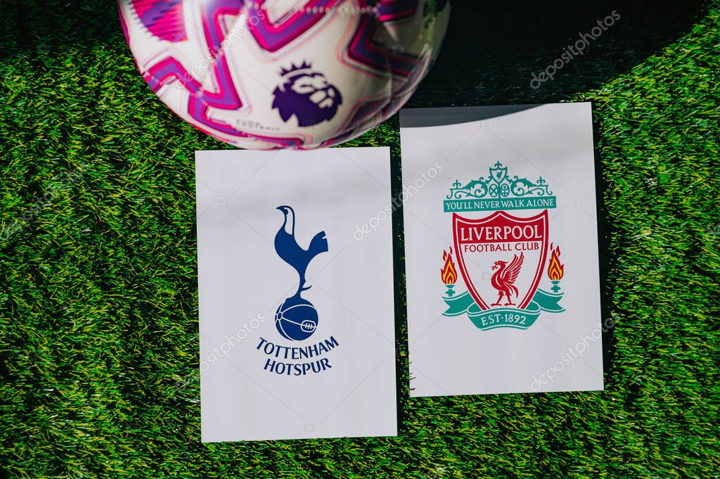 VIENNA, AUSTRIA, MAY 26, 2025: Tottenham Hotspur vs Liverpool derby football match in Premier League. Club logo and official ball on green soccer grass.