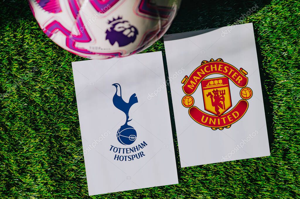 VIENNA, AUSTRIA, MAY 26, 2025: Tottenham Hotspur vs Manchester United derby football match in Premier League. Club logo and official ball on green soccer grass.