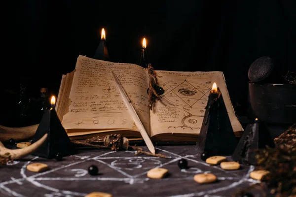 Open Old Book Magic Spells Runes Black Candles Witch Table — Stock Photo, Image