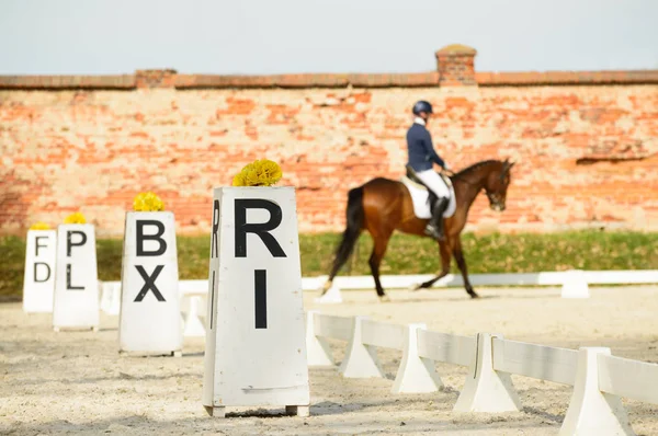 Horse riding stable, information rails for riders.