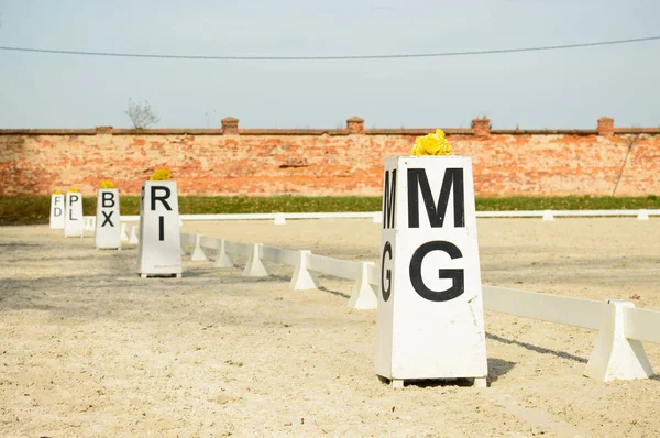 Horse riding stable, information rails for riders.