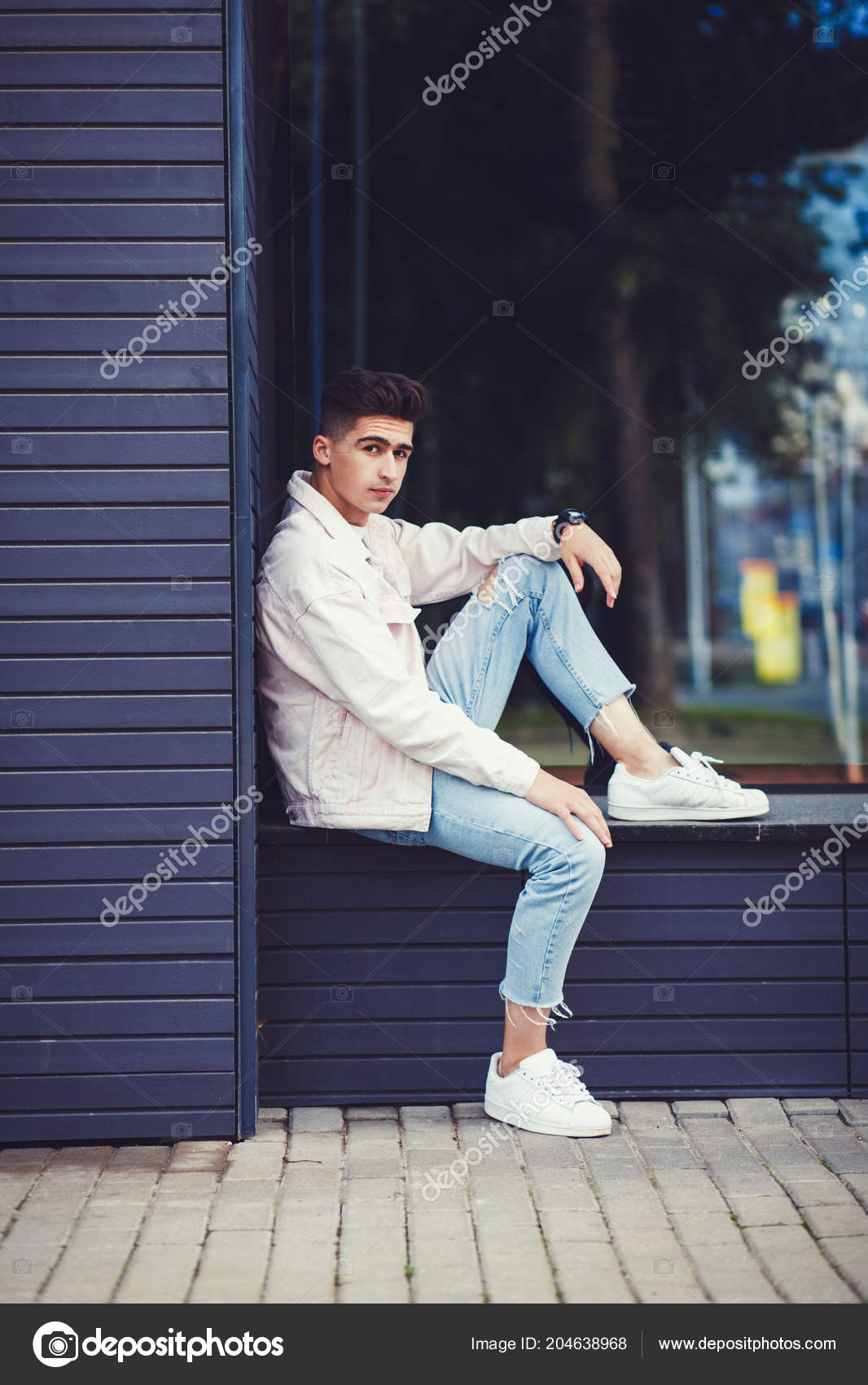 Fashionable Man Denim Jacket White Shoes Posing Urban Style Stock Photo by  ©jozzeppe 204638968