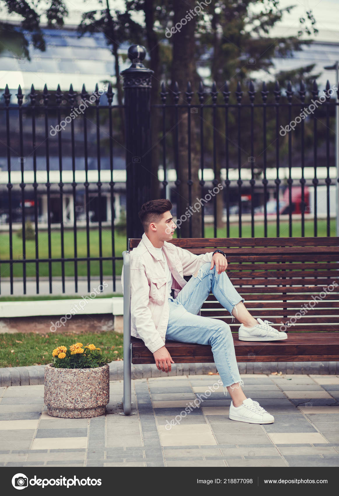 Handsome Fashionable Young Man White Jacket White Shoes Sitting