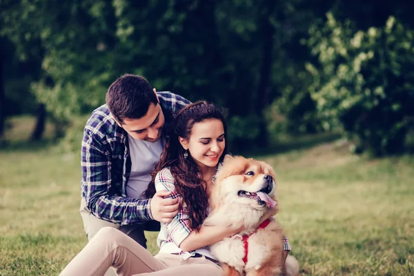 beautiful young couple and dog