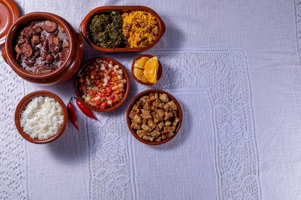 Feijoada, the Brazilian cuisine tradition with space for text.