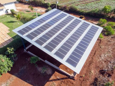 Photovoltaic plant built on top of a metal structure in residence, clipart