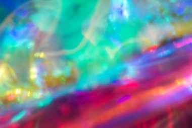 Soyut bulanık holografik folyo arka planı. Gökkuşağı arkaplanı